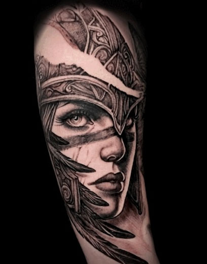 Tattoo by Lila Rees at Rock City Tattoo, with press coverage in Inked, Rebel Ink, among others.